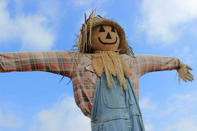 low-angle-view-scarecrow-against-cloudy-sky-562838541-5aaf18adfa6bcc00360a609c
